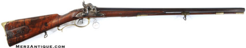 A percussion muzzleloading .58 caliber rifle/20 gauge shotgun combo, German, 19th century.For sale b