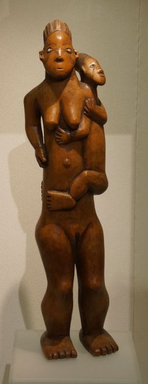 Wooden sculpture of a mother and child, of the Magbetu people, Democratic Republic of the Congo.  No