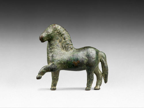 letsgostealthelouvre:Ancient people loved them some horses.[ID: A small bronze sculpture of a thicks
