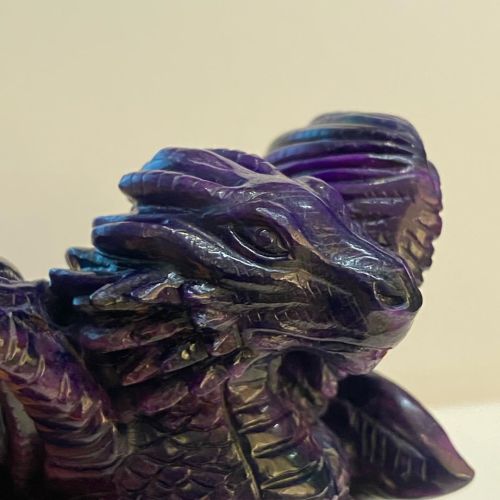 Hand carved sugilite dragon. #stonecarving #handcarved #sugilitehttps://www.instagram.com/p/B5gxAV