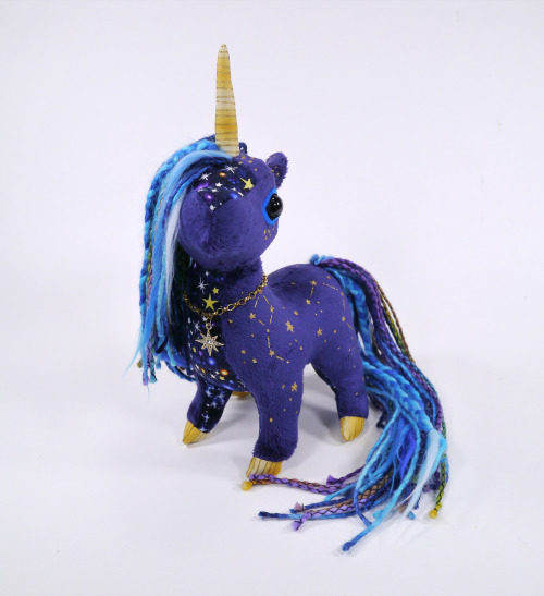 A celestial Unicorn I made is now up for adoption!  :D  I love the hand-painted stars on t