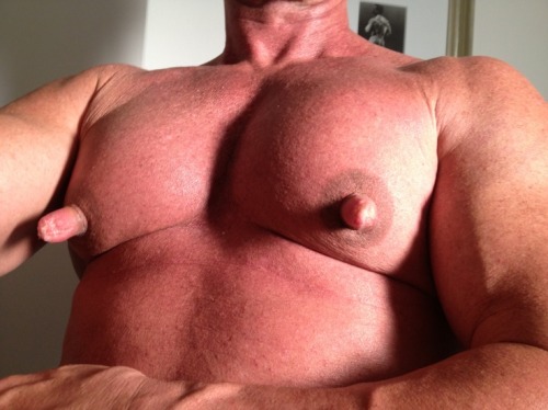 He is one very handsome man and with exceptional pecs and awesome nips!  WOOF
