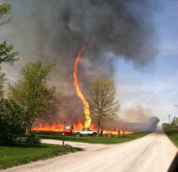 ninepulse:  A “firenado” tears through a field in Chillicothe, Missouri on 3 May. Part fire, part tornado, this blazing twister was spotted by Missouri native Janae Copelin while she was out driving.Photograph: Janae Copelin /Barcroft  Wow..