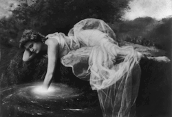 aqua-regia009:  Andromeda - GIF: Bill Domonkos, 2017 Photo: Young woman in graceful gown, full lgth., lying on bank and touching flower in water. -Library of Congress 