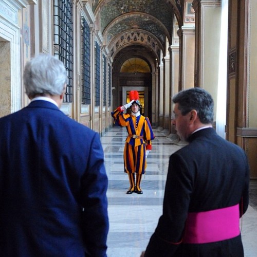 A Swiss Guard salutes Secretary Kerry during his tour of the Vatican today. What year did the U.S. e