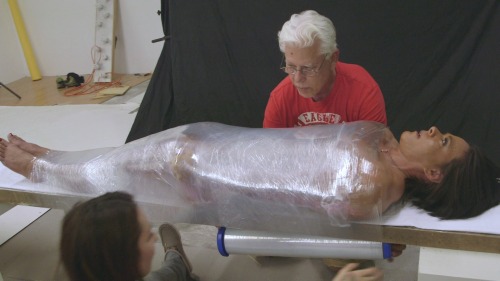 www.theserenasteel.com *Custom Video Script* This is a challenge to see if Serena can escape from being mummified  with a roll of industrial strength shrink wrap. This video is filmed with minimal cuts and is as authentic as you will see. Part 1 has her