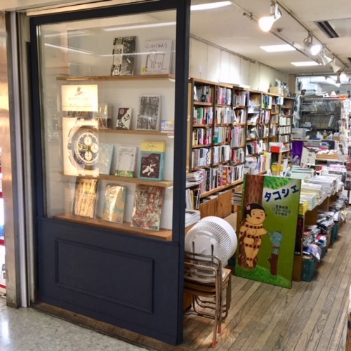 our book in the storefront display of taco che :)