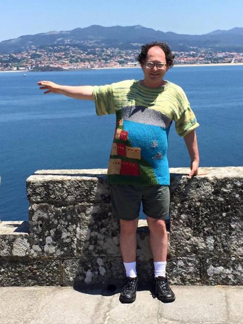 road-twitch:  mymodernmet: Guy Knits Sweaters of Places, Then Wears Them in Front of the Real Place  I still refuse to believe the world is 100% a flaming trash heap because look at this. 