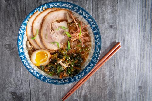 Tokyo noodles, Kimchi collards, benne seed, smoked ham hock broth