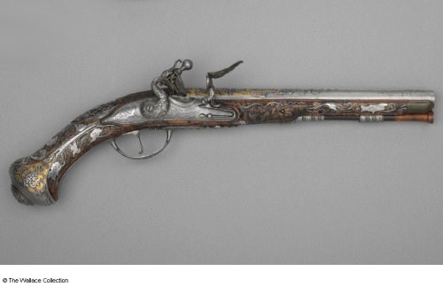 Ornate flintlock pistol crafted by Ertell of Dresden, Germany, circa 1740.Currently on display with 
