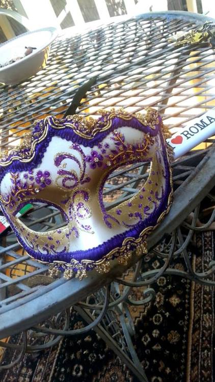 one of mums lovely gifts from Venice. Handmade venetian mask. (pity I can only wear it without my gl