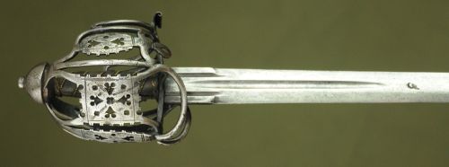 art-of-swords:  Basket-hilt Sword Dated: 18th century Culture: Scottish Medium: steel The blade of the sword is most likely made during the 17th century, while the hilt, tick steel hilt decorated with pierced work and chiselled details, is 18th century.