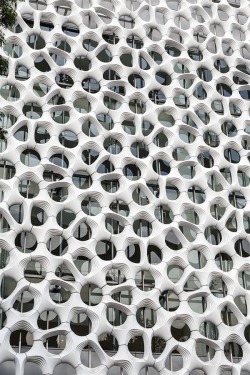 cjwho:  Fighting a Megacity’s Pollution, Mega Style Elegant Embellishments’ sculptural façade system does double duty as an air-cleaning cladding. In 1992, the United Nations called Mexico City “the most polluted city on the planet.” With an