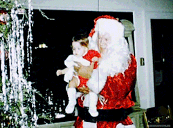 obsessivenostalgia:  For Lisa’s first Christmas her grandpa Vernon dressed up as Santa Claus. 