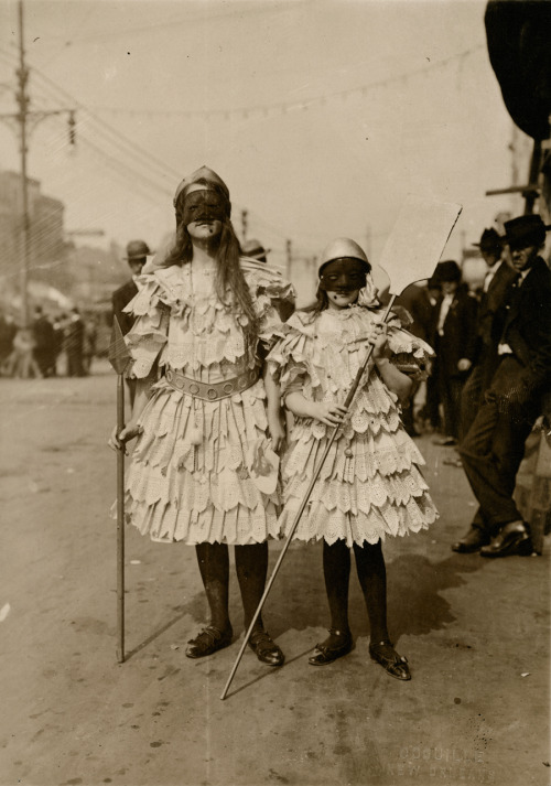 Children wearing Mardi Gras costumes in New Orleans, Louisiana.Photograph by John Hypolite Coquille,