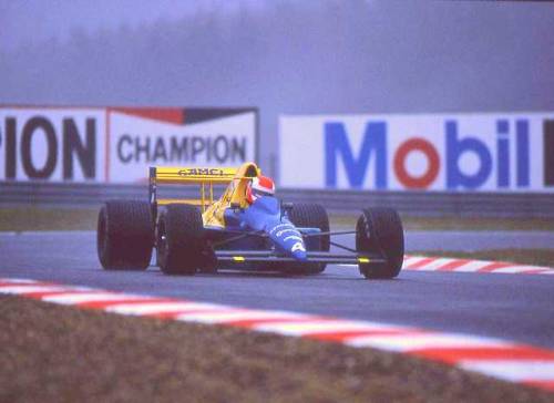 Johnny Herbert powering his Tyrrell 018 around a wet Spa-Francorchamps during the 1989 Belgian Grand