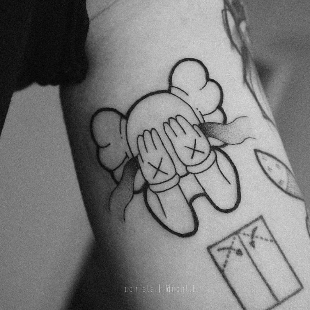 Understanding the Meaning of KAWS Tattoo Designs  Impeccable Nest