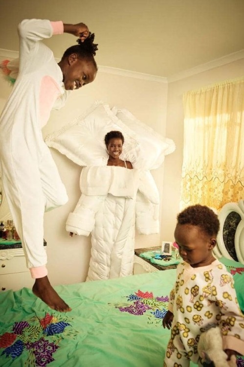 Adut Akech Bior with her family and friends photographed by Charlie Dennington for Vogue Australia, 
