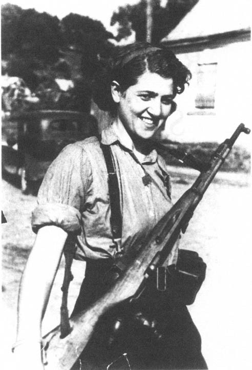 the-female-soldier:
Sara Ginaite was a Jewish Lithuanian partisan who fought against Nazi occupation during the Second World War.
Ginaite was born in 1924 in Kovno (Kaunas), Lithuania. She was educated in a Lithuanian-speaking school, which she was about to graduate from when Nazi Germany invaded the country in 1941. Three of Ginaite’s uncles were killed in the Kaunas Pogrom,
 a massacre of Jewish people that the Nazi’s encouraged the Lithuanian 
population to perform. The pogrom resulted in the deaths of 9200 people,
 almost half of them children. The surviving members of Ginaite’s family
 were incarcerated in the Kovno Ghetto, along with 40,000 Jewish people.
While
 living in the ghetto Ginaite joined the Anti-Fascist Fighting 
Organization (AFO) to take part in the resistance against the Nazis. She
 began a relationship with their charismatic youth leader, Misha Rubinson, and the two married in 1943. The pair broke out of the Kovno Ghetto that winter, escaping to the Rudninkai Forest where they established a partisan military unit named ‘Death to the Occupiers’.
Ginaite
 returned to the Kovno Ghetto twice to help others to escape, once 
disguised as a nurse claiming she was there to escort four sick workers.
 In 1944 Ginaite and Rubinson took part in the liberation of the Vilna and Kovno ghettos, although by this time 90% of the Jewish populations inside had been killed. Ginaite’s own family were all dead, save for her sister and a young niece.
After the war, Ginaite fought against rampant anti-semitism to become a professor of Political Economics at Vilnius University, where she published award-winning books
 on the Holocaust in Lithuania. Following her husband’s death in 1983, 
she moved to Canada to live with her two daughters and continue her 
academic career. #women in war #jewish#wwii#ww2