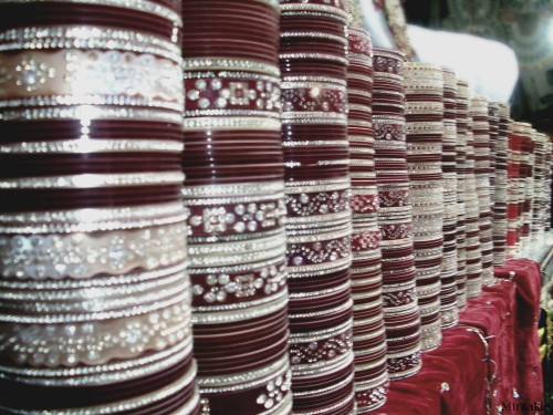 Indian bridal choora.It&rsquo;s a set of bangles that are usually red and white, they are worn by an