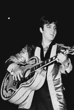 Elvis performing at the Auditorium in Ottawa, Canada. April 3, 1957. 