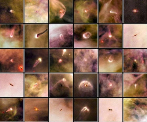 space-pics:30 proto-planetary discs in the Orion Nebula, baby solar systems in the making. (image cr