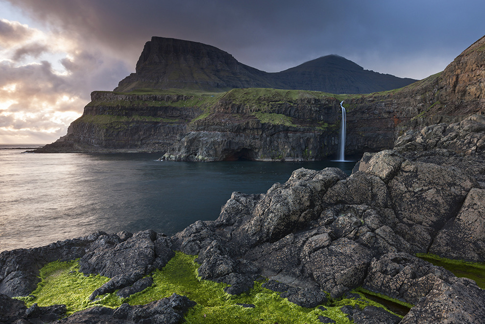 Daily Travel Photo : Gásadalur, Faroe Islands
Photograph by Adam Burton, JAI/Corbis
It wasn’t until a tunnel was built in 2004 that the residents of Gásadalur had an easy path to and from their home. At the time, the village—perched above this iconic...