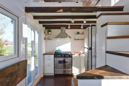 litbugi:This tiny home exudes spaces and has some great features such as a double sink in the bathroom, double loft space, lots of windows, and a washer/dryer unit: http://tinyhouseswoon.com/custom-tiny-living-home/