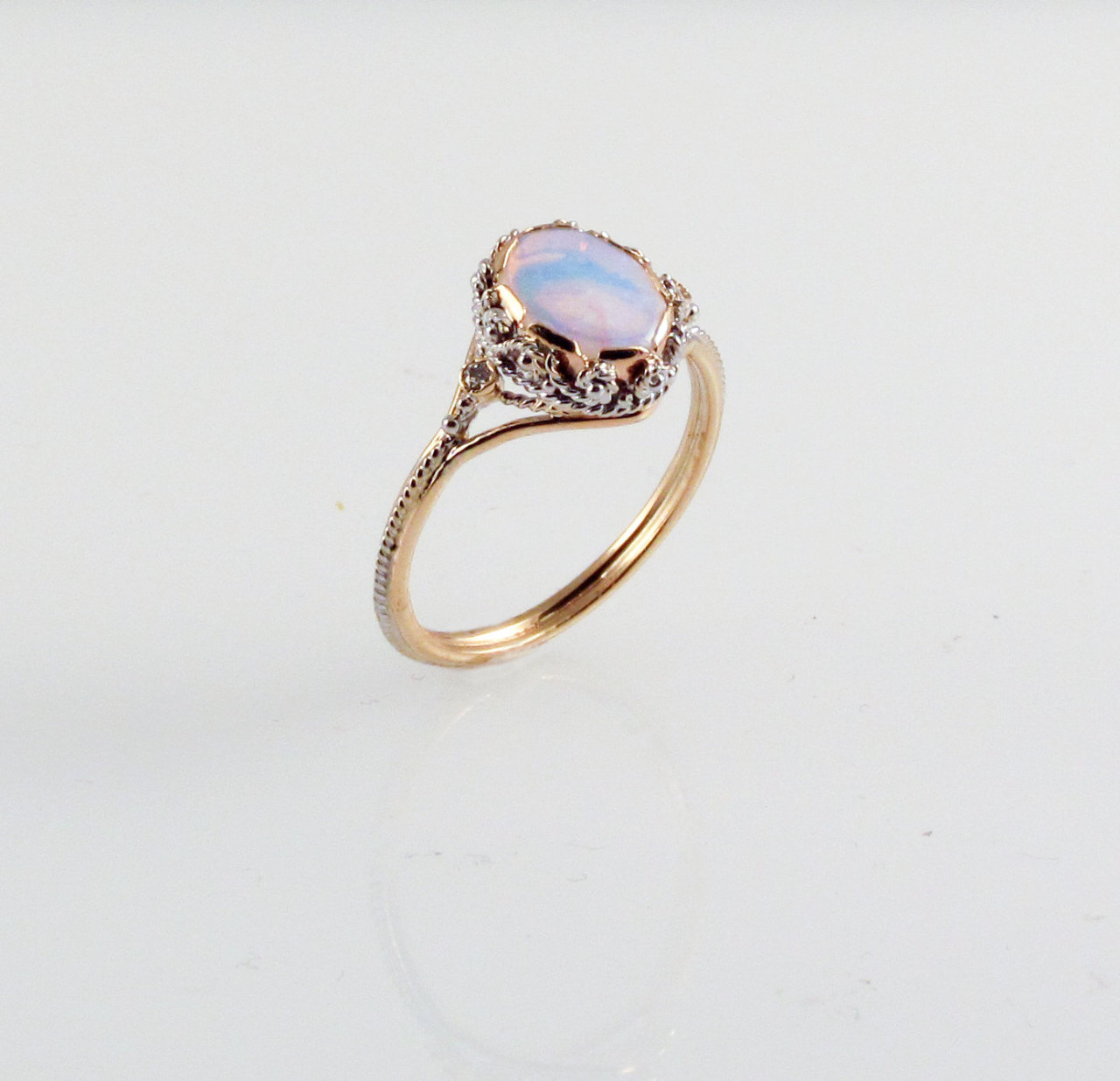 nylo-noodles:  drythroats:  Opal Dream Ring in 14k Gold. https://www.etsy.com/listing/165785280/opal-dream-ring-in-14k-gold?ref=shop_home_active_3