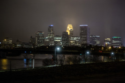 minneapolisatnight:  Just a quick rainy shot of our skyline Minneapolis @ Night 