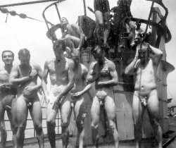 vintagemusclemen:  Submarine crew showering on deck.