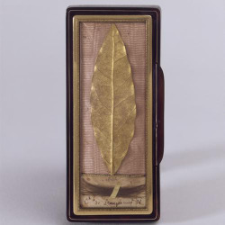 fapoleon-bonerparte:  Laurel leaf from the laurel wreath used at the coronation of Napoleon I. Mounted in a box frame. Gold. Circa 1804. Martin-Guillaume Biennais (1764-1843). [Source] 