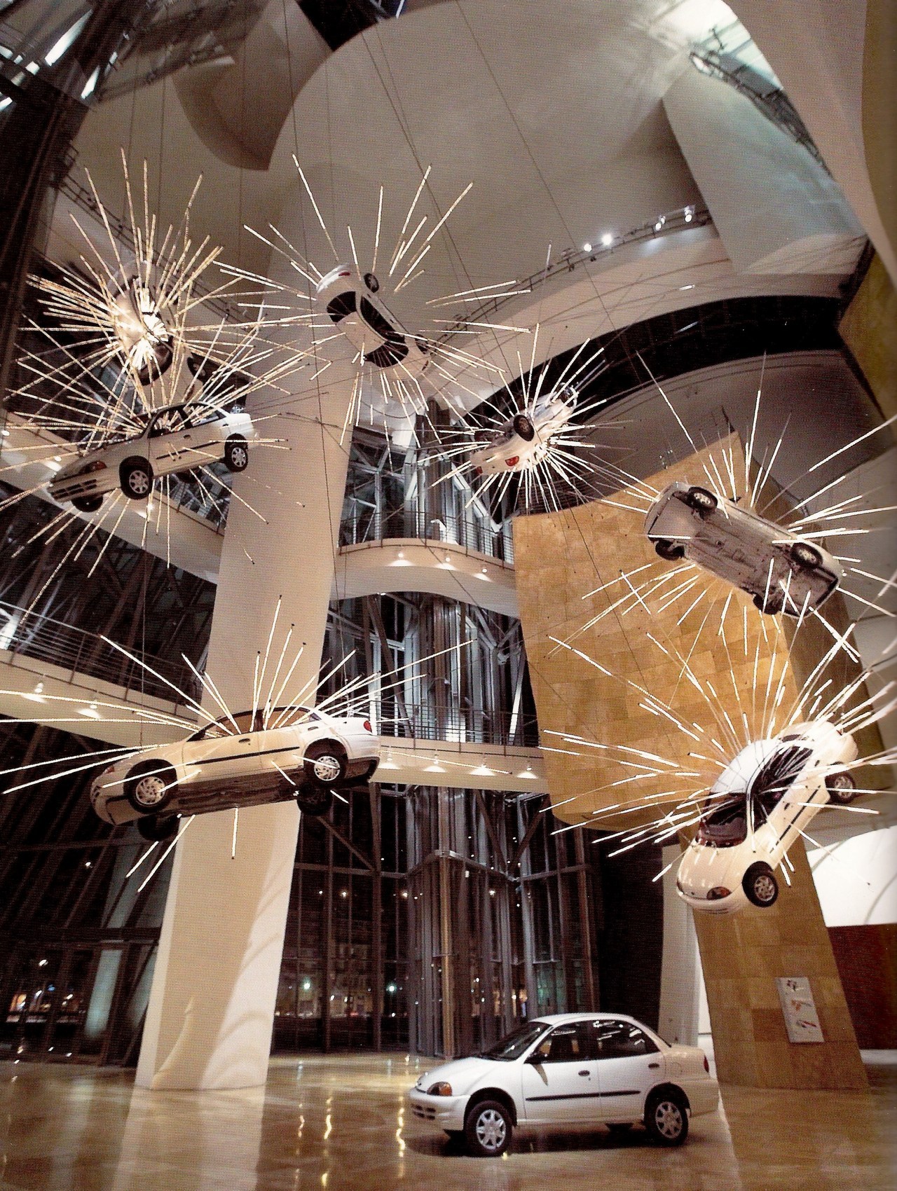 “Inopportune: Stage One” (2004) - Cai Guo-Qiang
Installation View: Guggenheim Museum, Bilbao – Nine cars and sequenced multichannel light tubes