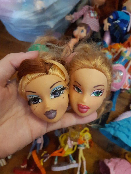 Bratz dolls and winx collaboration in y2k style with wings and sparkles on  Craiyon