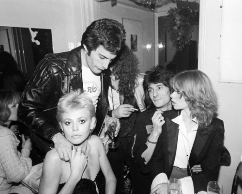 i-will-be-a-legend:Freddie Mercury celebrating New Year’s Eve with Britt Ekland, Ronnie and Jo Wood, 1979 by Richard Young