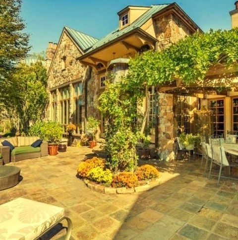 Porch DC MetroLarge Cottage Stone Porch Photo With A Pergola