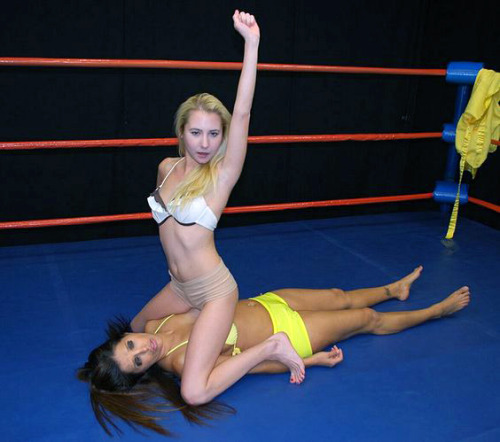 Odette posing in victory over ko’d Francesca Le