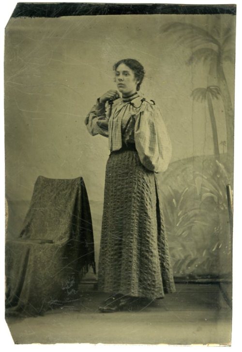 ca. 1870-1900s, [candid tintype portrait of a young woman with one arm]