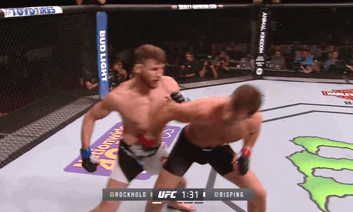 ildirigente:  Michael Bisping shocks the world with 1st-round KO of   Luke Rockhold to become Britain’s first UFC champion. 