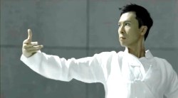 taichiclothinguniforms:  The character of Tai Chi —Store energy like drawing a bow; release it like shooting an arrow. Kung Fu Star performs Tai Chi Push Hands for us. Donnie Yen as a Kung Fu master, who know Tai Chi has some good actions, likes to