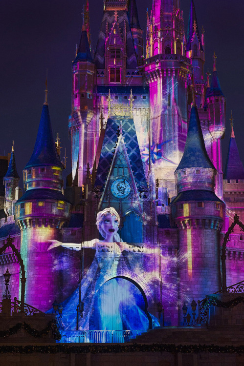 kioewen:  Elsa Takes Residence at Walt Disney World Castle From the Celebrate the Magic show at the Magic Kingdom in Walt Disney World, featuring Cinderella’s Castle transformed by light into the Castle of Arendelle. Source: Disney Parks Blog, [here].