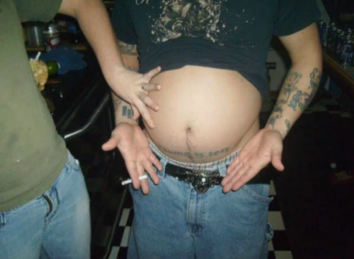 vore-acious:  dudeswithguts:  Won’t be able to see that tattoo for much longer  HOly shit he looks stuffed 
