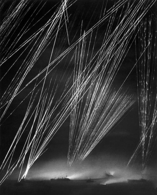 historicaltimes: Anti-aircraft fire at the Battle of Okinawa, March 1945. Photograph by W. Eugene Sm
