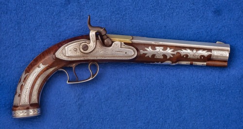 Contemporary made silver decorated percussion pistol handcrafted by Wiley G. Higgins of Indian Sprin