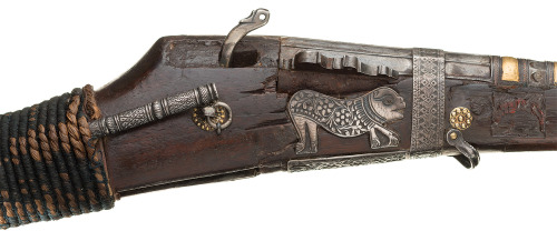 A silver decorated matchlock musket, 18th century.Rock Island Auction says its from the Mediterranea