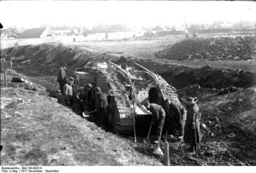 scrapironflotilla:German soldiers make preparations to recover a knocked out British Mark IV tank af