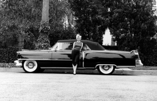 Marilyn Monroe with her 1954 Cadillac Eldorado Convertible / photo by Milton Greene, 1956.