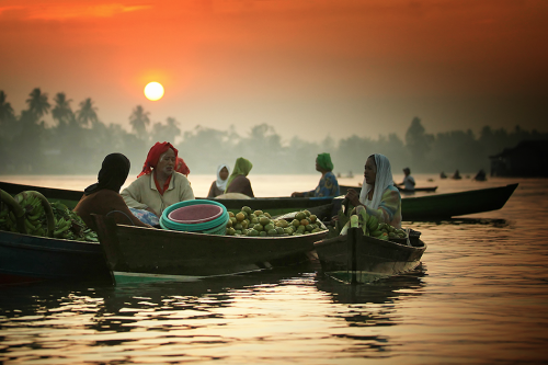 nubbsgalore:the lok baintan floating farmers market is located outside banjarmasin, south borneo, in