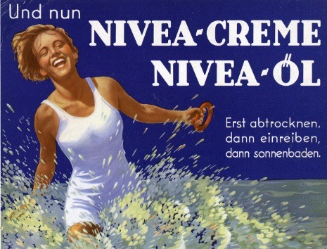 mudwerks:Nivea-Creme, Nivea-Oil,and now nivea dry first, then rub, then sunbathe (1933) (by Susanlenox)
