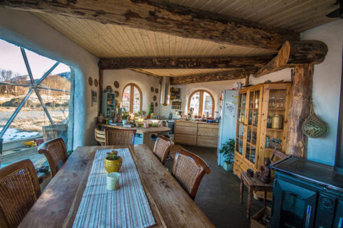 A gorgeous cob home wrapped in a geodesic dome.Source: Inhabitant